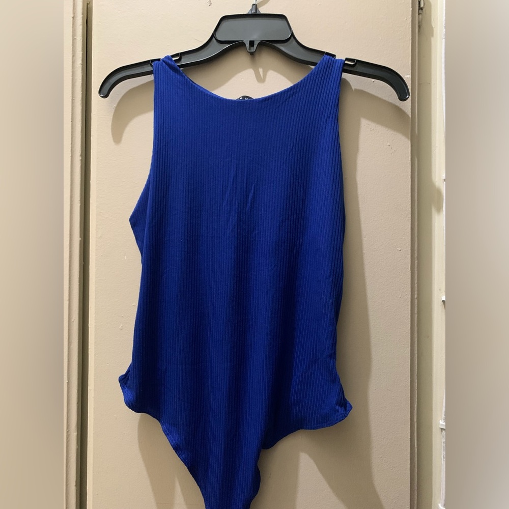 Women’s blue body suit